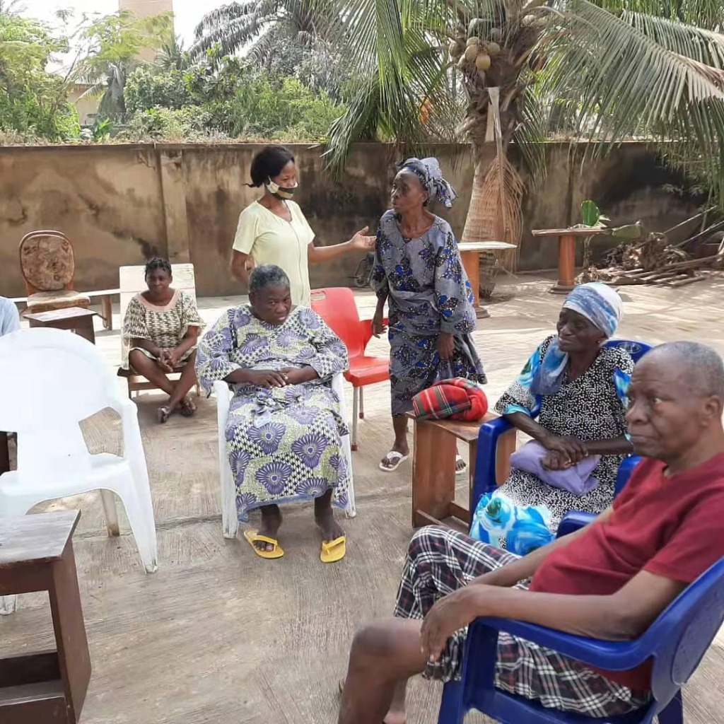 Elderly care gathering outdoors in Ibadan